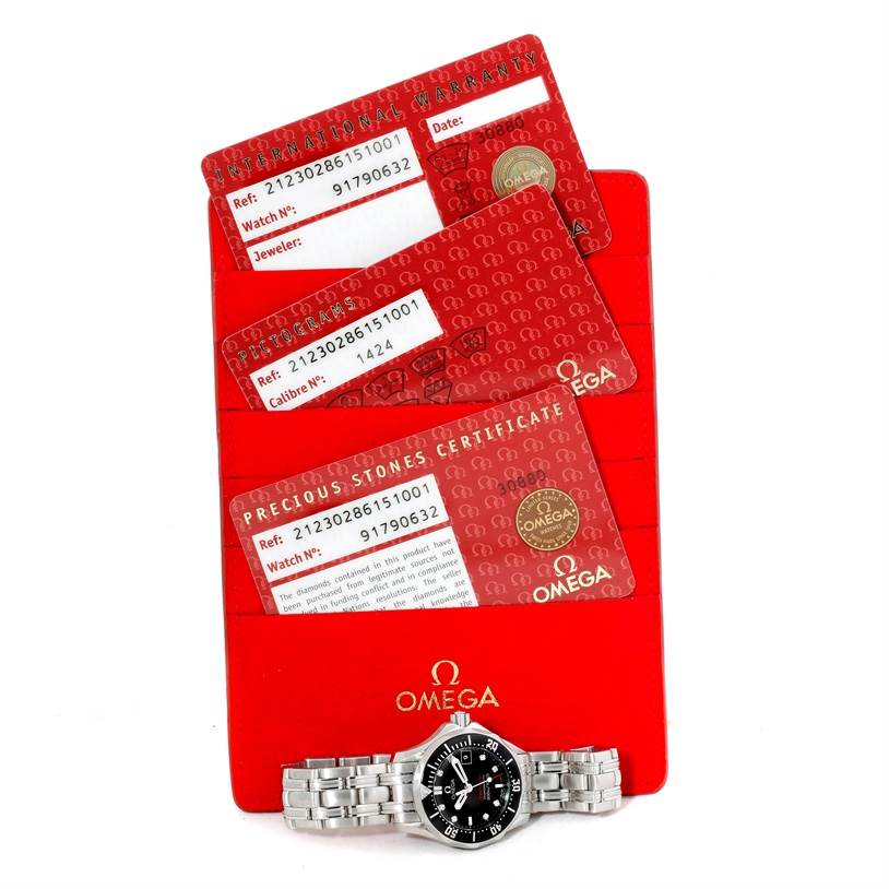 The image shows the Omega 212.30.28.61.01.001 Women's Stainless Steel Black Dial 212.30.28.61.01.001 Women's Stainless Steel Black Dial Seamaster Professional Diamond Ladies Watch 212.30.28.61.51.001 with its warranty and certification cards.