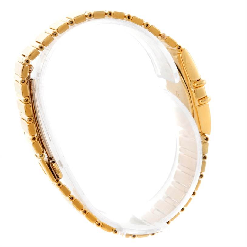 The image shows a side view of the bracelet and case of the Omega Women
s Blue Dial Women
s Blue Dial Constellation 18K Yellow Gold Diamond Lapis Dial Watch.