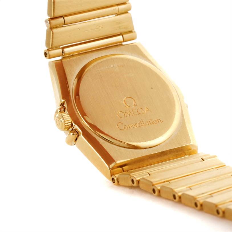 This is a rear view of the Omega Women
s Blue Dial Women
s Blue Dial Constellation 18K Yellow Gold Diamond Lapis Dial Watch, showcasing its back case and bracelet.