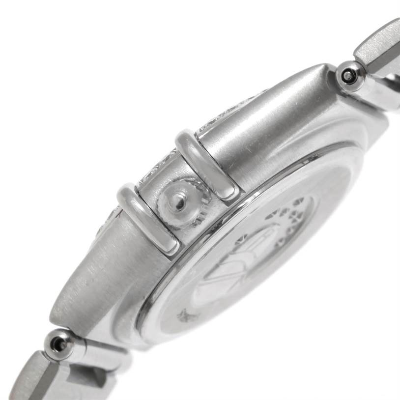 This image shows a side view of an Omega 1466.71.00 Women
s Stainless Steel Mother of Pearl Dial 1466.71.00 Women
s Stainless Steel Mother of Pearl Dial Constellation 95 My Choice Ladies Mini Watch, model 1466.71.00, highlighting the crown and part of the bracelet.