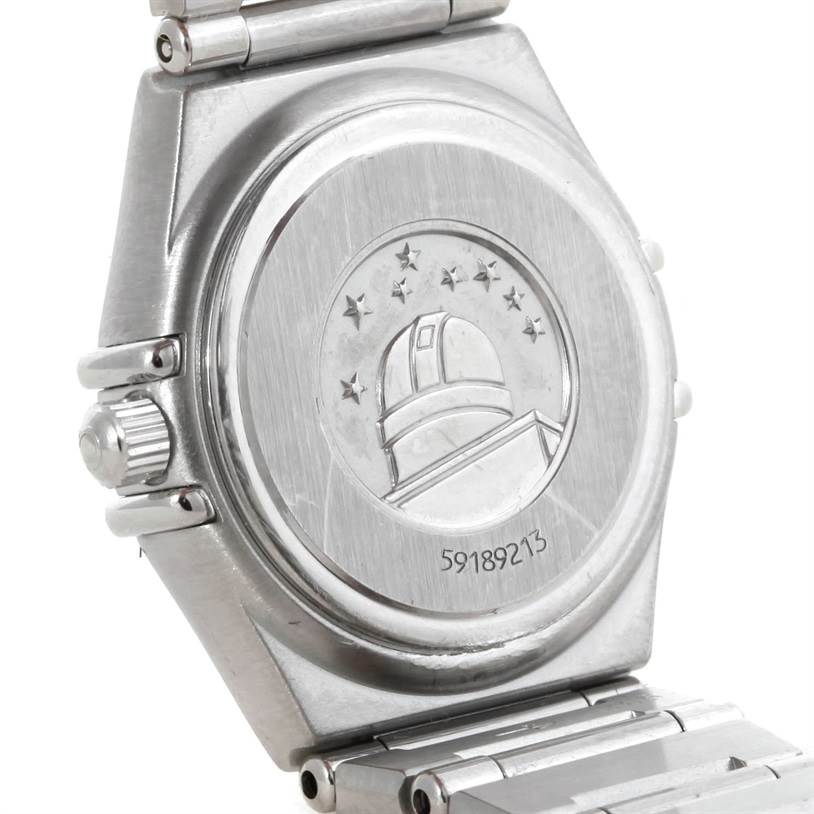This image shows the back casing and part of the bracelet of the Omega 1466.71.00 Women
s Stainless Steel Mother of Pearl Dial 1466.71.00 Women
s Stainless Steel Mother of Pearl Dial Constellation 95 My Choice Ladies Mini Watch 1466.71.00.