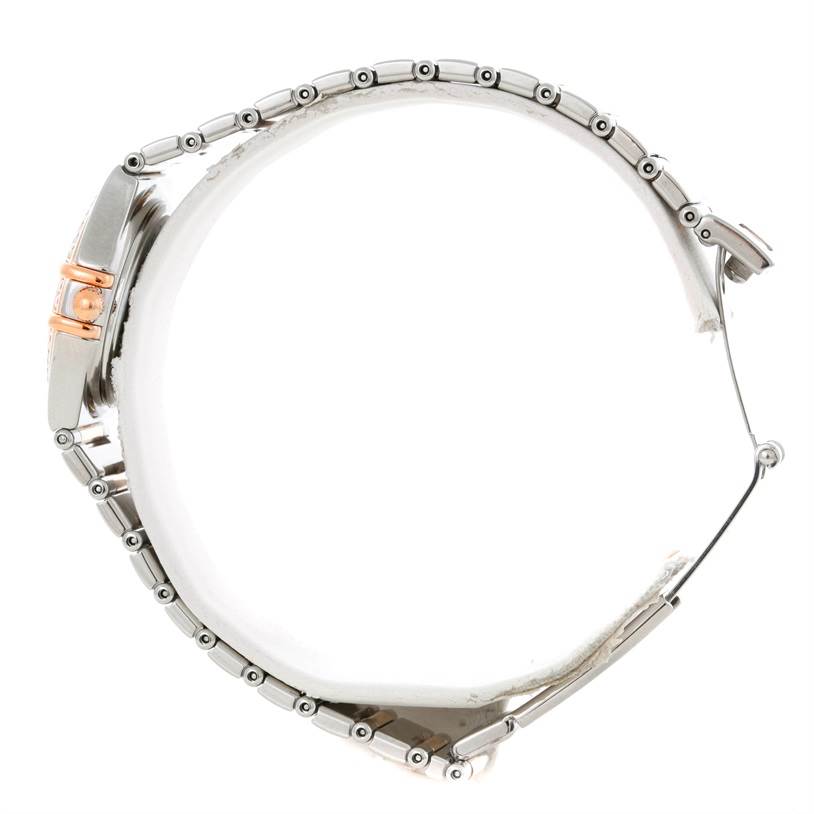 This side-profile view of the Omega 1358.79.00 Women
s Steel and Gold (two tone) Mother of Pearl Dial 1358.79.00 Women
s Steel and Gold (two tone) Mother of Pearl Dial Constellation Iris Steel Rose Gold Multi Stone Watch 1358.79.00 showcases its bracelet and clasp.