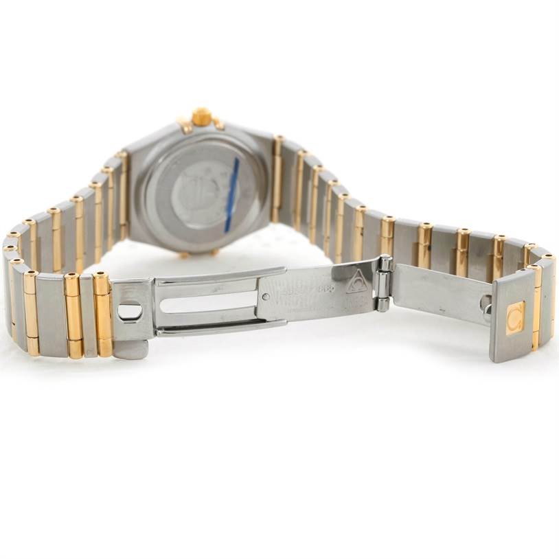 This image shows the back and open clasp of an Omega 1267.70.00 Women
s Steel and Gold (two tone) Mother of Pearl Dial 1267.70.00 Women
s Steel and Gold (two tone) Mother of Pearl Dial Constellation My Choice Mini Steel Gold Diamond Watch 1267.70.00.