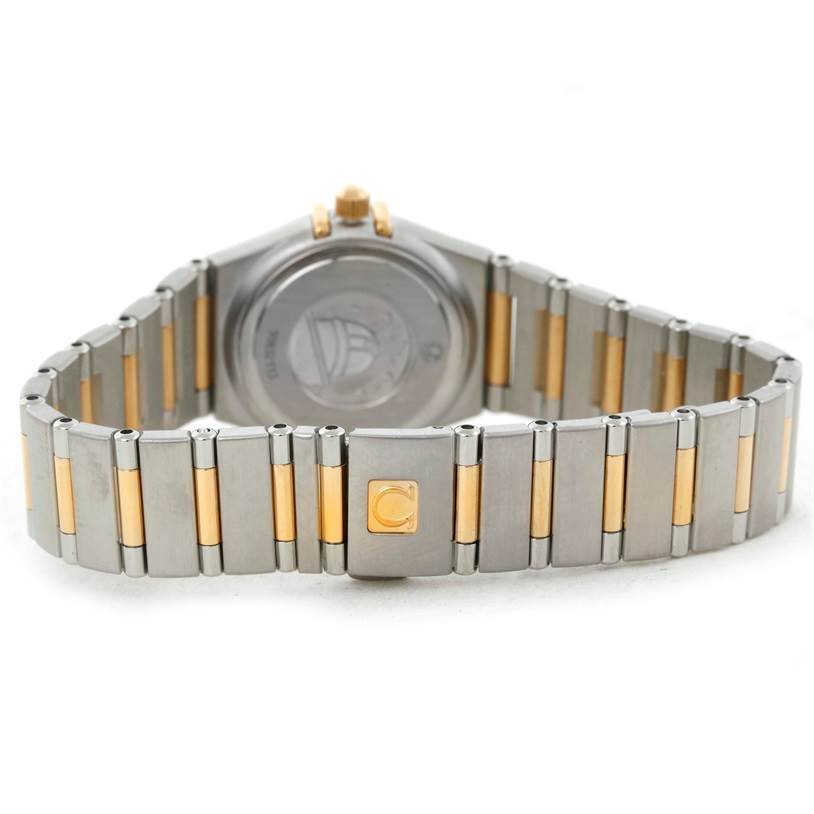 The image shows the back view and bracelet of the Omega 1367.79.00 Women
s Steel and Gold (two tone) Mother of Pearl Dial 1367.79.00 Women
s Steel and Gold (two tone) Mother of Pearl Dial Constellation Iris Steel Yellow Gold Multi Stone Watch 1367.79.00.