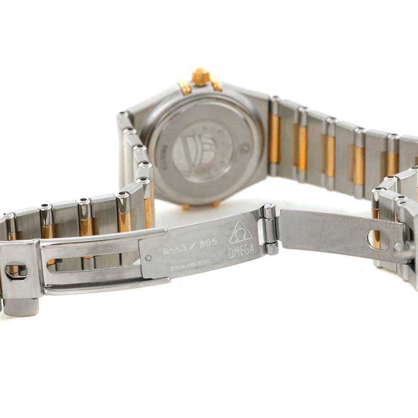 The image shows the back case and partial bracelet of an Omega 1367.79.00 Women
s Steel and Gold (two tone) Mother of Pearl Dial 1367.79.00 Women
s Steel and Gold (two tone) Mother of Pearl Dial Constellation Iris Steel Yellow Gold Multi Stone Watch, model 1367.79.00.