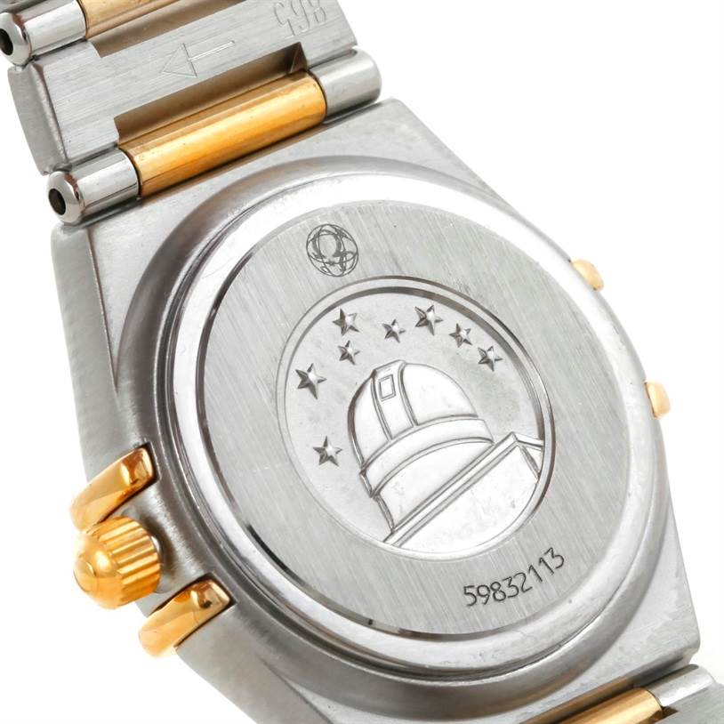 The image shows the back case and part of the bracelet of the Omega 1367.79.00 Women
s Steel and Gold (two tone) Mother of Pearl Dial 1367.79.00 Women
s Steel and Gold (two tone) Mother of Pearl Dial Constellation Iris Steel Yellow Gold Multi Stone Watch, model 1367.79.00.