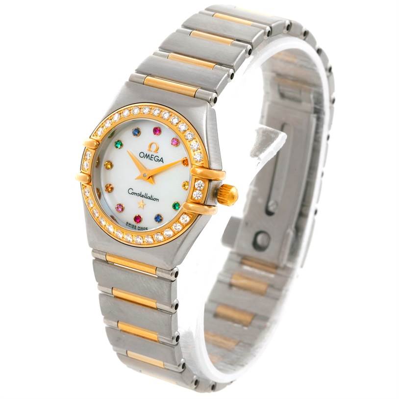 This image shows an angled view of the Omega 1367.79.00 Women
s Steel and Gold (two tone) Mother of Pearl Dial 1367.79.00 Women
s Steel and Gold (two tone) Mother of Pearl Dial Constellation Iris Steel Yellow Gold Multi Stone Watch 1367.79.00, highlighting the bezel, dial, and bracelet.