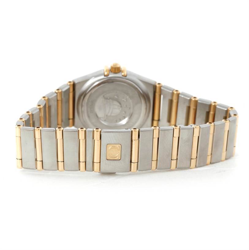The image shows the back and bracelet of the Omega 1372.70.00 Women
s Steel and Gold (two tone) Mother of Pearl Dial 1372.70.00 Women
s Steel and Gold (two tone) Mother of Pearl Dial Constellation Steel and Gold Ladies Watch 1372.70.00.