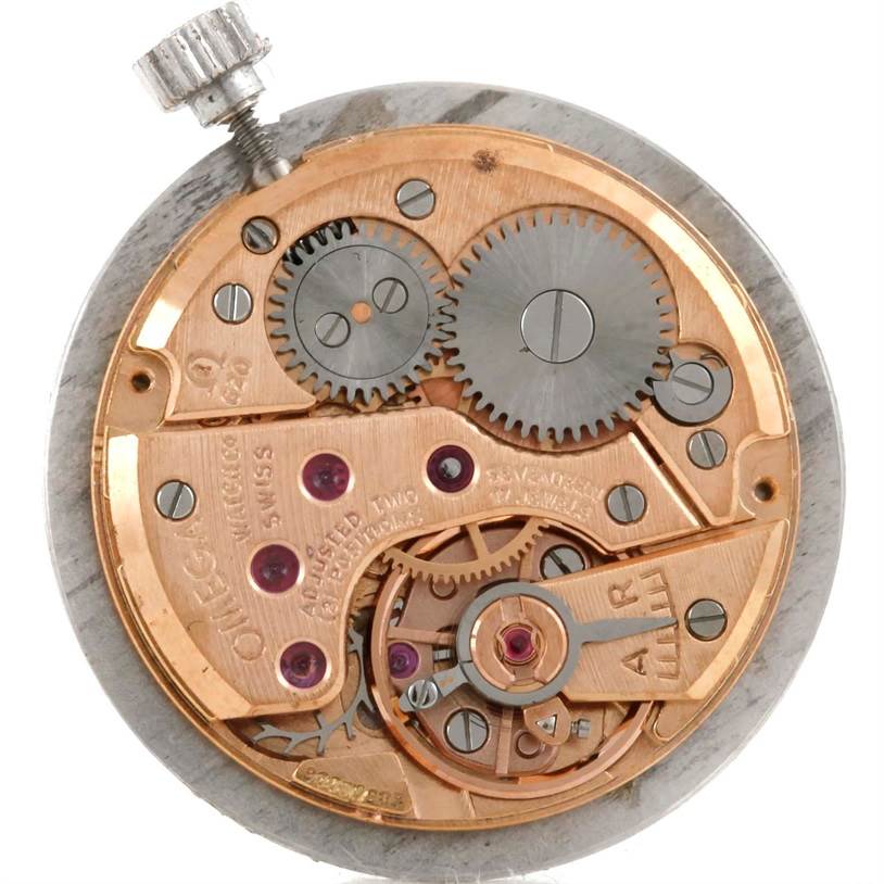 This image shows the internal mechanical movement of an Omega Women
s White Gold Silver Dial Women
s White Gold Silver Dial Vintage Ladies 18k White Gold 2 ct Diamond Cocktail Watch viewed from the back.