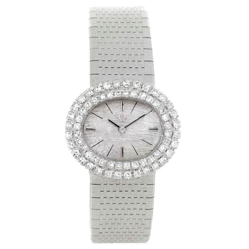 The image shows a front view of the Omega Women
s White Gold Silver Dial Women
s White Gold Silver Dial Vintage Ladies 18k White Gold 2 ct Diamond Cocktail Watch, highlighting its face and band.
