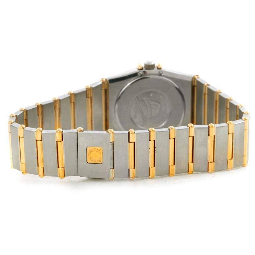 The image shows the back and bracelet of an Omega Women's Steel and Gold (two tone) Black Dial Women's Steel and Gold (two tone) Black Dial Constellation My Choice Mini Steel Gold Diamond Watch.