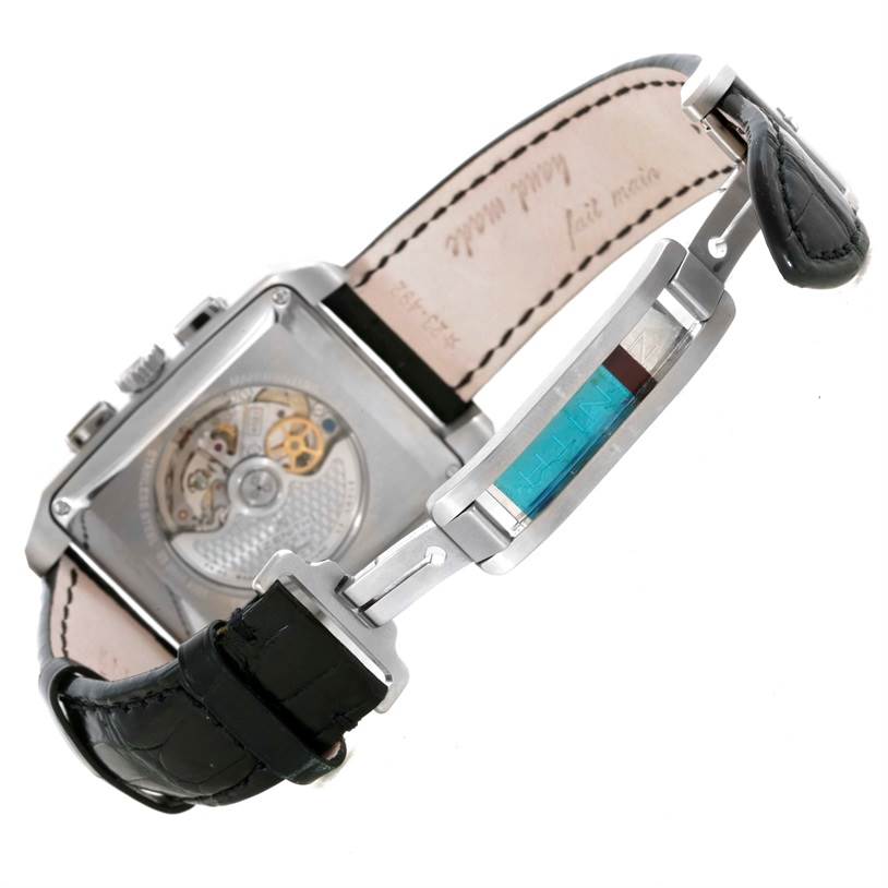 The image shows the back view of the Zenith Port Royal 03.0550.4021/21.C503 Men's Stainless Steel Black Dial 03.0550.4021/21.C503 Men's Stainless Steel Black Dial watch, featuring a visible movement and a partially open leather strap.