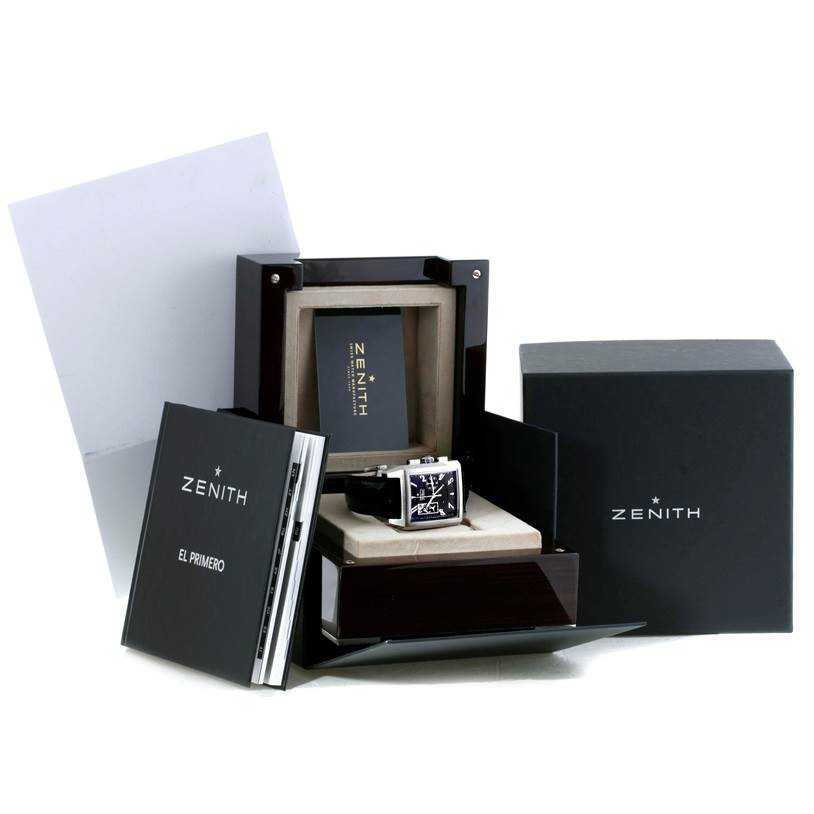 The image shows the Zenith Port Royal 03.0550.4021/21.C503 Men's Stainless Steel Black Dial 03.0550.4021/21.C503 Men's Stainless Steel Black Dial model watch at a slight angle in its opened box, with accompanying booklets and packaging.