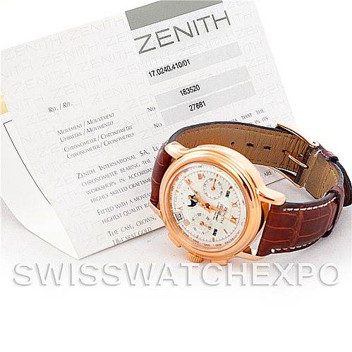 This image displays the Zenith Chronomaster 17.0240.410 Rose Gold Silver Dial 17.0240.410 Rose Gold Silver Dial watch at an angle showing the face, bezel, and leather strap, with warranty documents in the background.