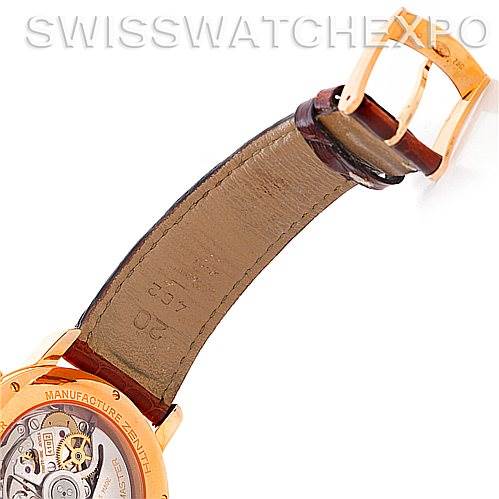 This image shows the underside of the leather strap and caseback of a Zenith Chronomaster 17.0240.410 Rose Gold Silver Dial 17.0240.410 Rose Gold Silver Dial watch at an angle.