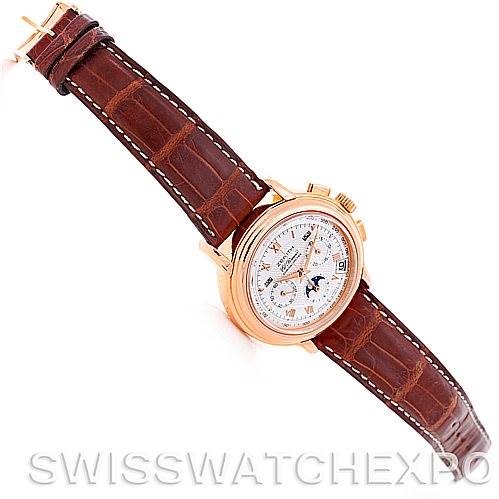 The Zenith Chronomaster 17.0240.410 Rose Gold Silver Dial 17.0240.410 Rose Gold Silver Dial watch is shown at a slightly tilted angle, displaying its dial, case, and brown leather strap with a visible clasp.