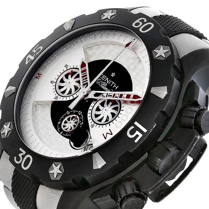 This image shows a close-up, side-angle view of the Zenith Defy 96.0525.4000 Men's Titanium Silver Dial 96.0525.4000 Men's Titanium Silver Dial watch, highlighting its bezel, dials, and crown.