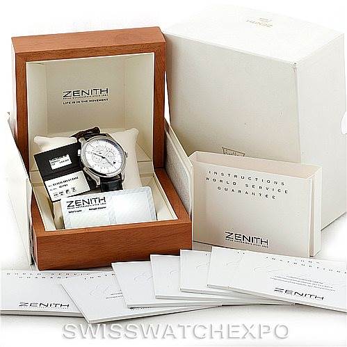 The image shows the Zenith 03.1260.4021/21.C505 Men's Stainless Steel Silver Dial 03.1260.4021/21.C505 Men's Stainless Steel Silver Dial Grande Class Reserve De Marche Dual Time Watch model 03.0520.683/01.C492 in its box with its accessories.