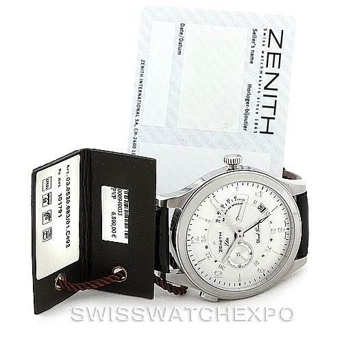 The Zenith 03.1260.4021/21.C505 Men's Stainless Steel Silver Dial 03.1260.4021/21.C505 Men's Stainless Steel Silver Dial Grande Class Reserve De Marche Dual Time Watch 03.0520.683/01.C492 is shown from a slight front angle, displaying the watch face and accessories including tags and certificates.