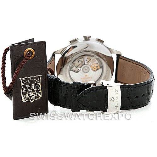 The image shows the rear view of the Zenith El Primero 03.0520.4002 Men
s Stainless Steel Black Dial 03.0520.4002 Men
s Stainless Steel Black Dial watch, highlighting its open case back, leather strap, and clasp, along with the tag.