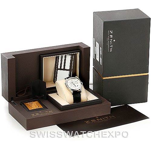 This image shows the Zenith 03.1260.4021/21.C505 Men's Stainless Steel Silver Dial 03.1260.4021/21.C505 Men's Stainless Steel Silver Dial Grande Class Reserve De Marche Dual Time Watch 03.0520.683/01.C492 model from a front angle, along with its box and accessories.