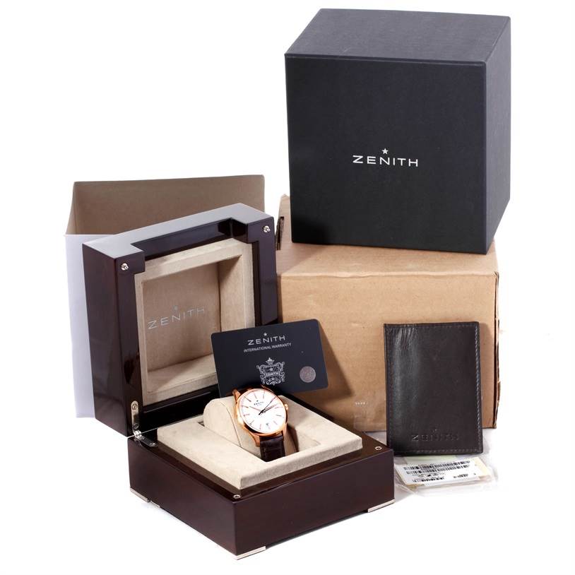 The image shows a Zenith Captain 18.2020.670 Men's Rose Gold White Dial 18.2020.670 Men's Rose Gold White Dial watch in its box, with related accessories and packaging, viewed from an angled top-down perspective.