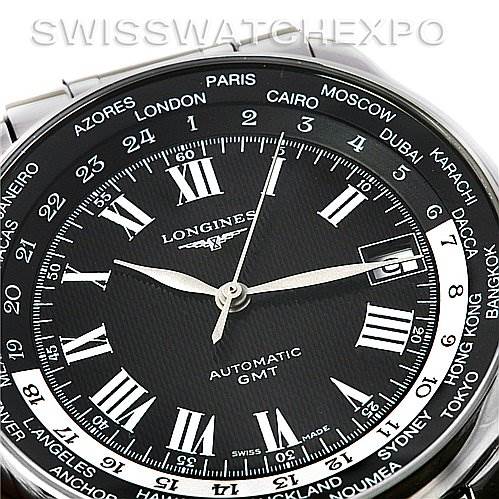 The image shows a close-up of the dial of the Longines L2.631.4.51.6 Men's Stainless Steel Black Dial L2.631.4.51.6 Men's Stainless Steel Black Dial Master Automatic GMT Men's Watch, model L2.631.4.51.6, highlighting the time zones.
