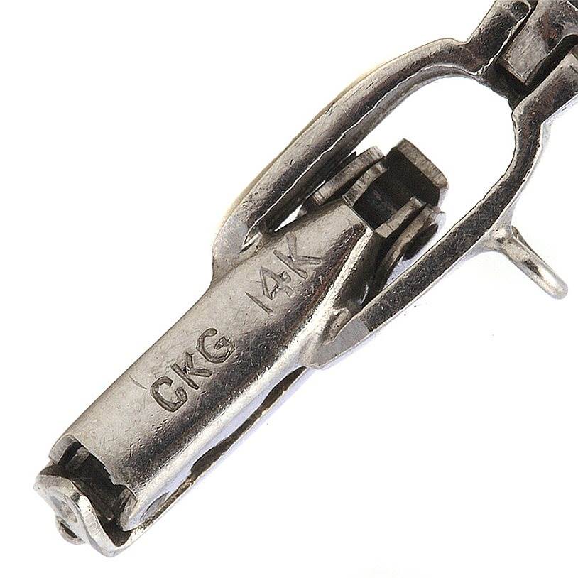 The image shows the clasp portion of the Longines Women's White Gold Silver Dial Women's White Gold Silver Dial Vintage Ladies 14k Gold Diamonds Watch with visible markings "14K."