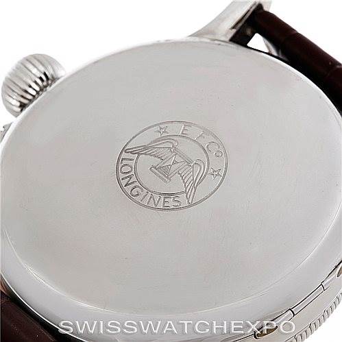 The image shows the back case of the Longines L2.678.4.11.0 Men's Stainless Steel Silver Dial L2.678.4.11.0 Men's Stainless Steel Silver Dial Heritage Lindberg Hour Angle Mens Watch L2.678.4.11.0, featuring its engraved logo.