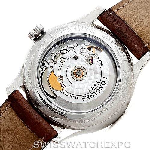 The image shows the back of the Longines L2.631.4 Men's Stainless Steel Black Dial L2.631.4 Men's Stainless Steel Black Dial Master Automatic GMT Men's Watch L2.631.4, highlighting its exposed movement and brown leather strap.