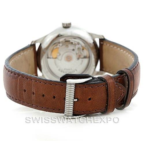 The image shows the Longines L2.631.4 Men's Stainless Steel Black Dial L2.631.4 Men's Stainless Steel Black Dial Master Automatic GMT Men's Watch L2.631.4 from the rear, highlighting its movement and leather strap.