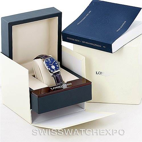 The Longines L2.631.4 Men's Stainless Steel Blue Dial L2.631.4 Men's Stainless Steel Blue Dial Evidenza Mens Steel Watch L2.631.4 is displayed in its open box, along with an instruction manual and outer packaging.
