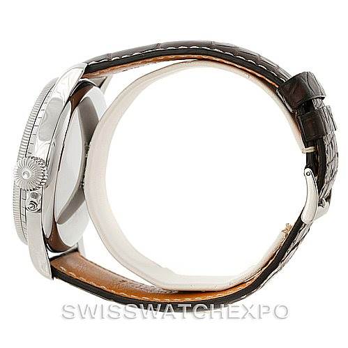 This image shows a side view of the Longines L2.678.4.11.0 Men
s Stainless Steel White Dial L2.678.4.11.0 Men
s Stainless Steel White Dial Heritage Lindbergh Hour Angle Watch L2.678.4.11.0, highlighting the watchcase, crown, and leather strap.