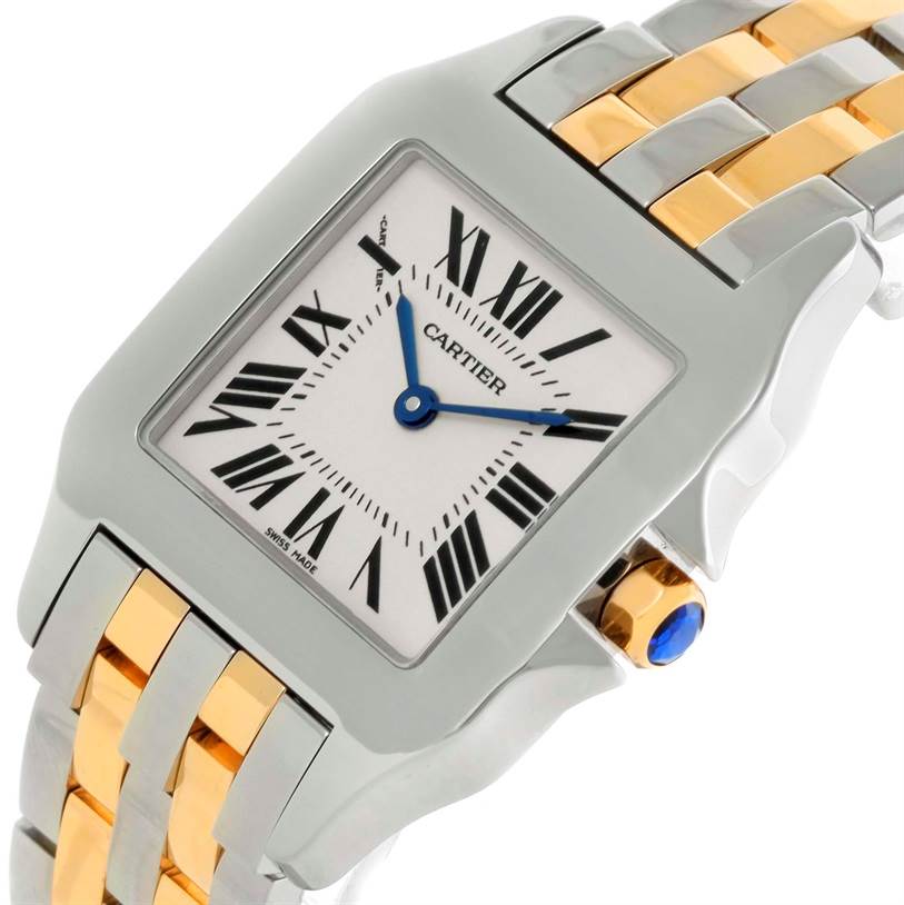 The Cartier Santos Demoiselle W25067Z6 Women's Steel and Gold (two tone) Silver Dial W25067Z6 Women's Steel and Gold (two tone) Silver Dial watch is shown at an angle highlighting its face, bezel, crown, and two-tone bracelet.