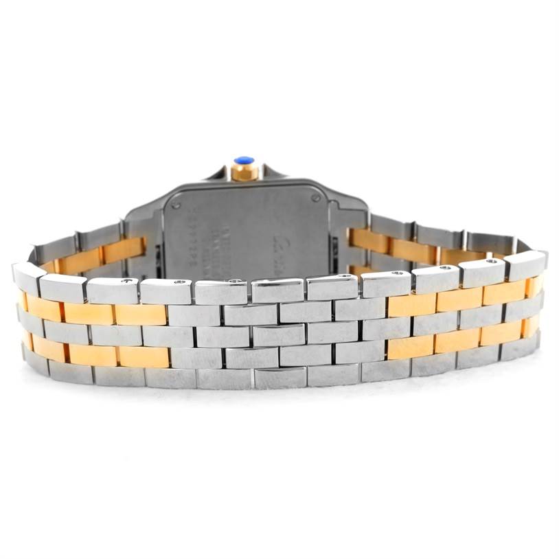 The image shows the back view of a Cartier Santos Demoiselle W25067Z6 Women's Steel and Gold (two tone) Silver Dial W25067Z6 Women's Steel and Gold (two tone) Silver Dial watch, highlighting its two-tone metal bracelet and caseback.