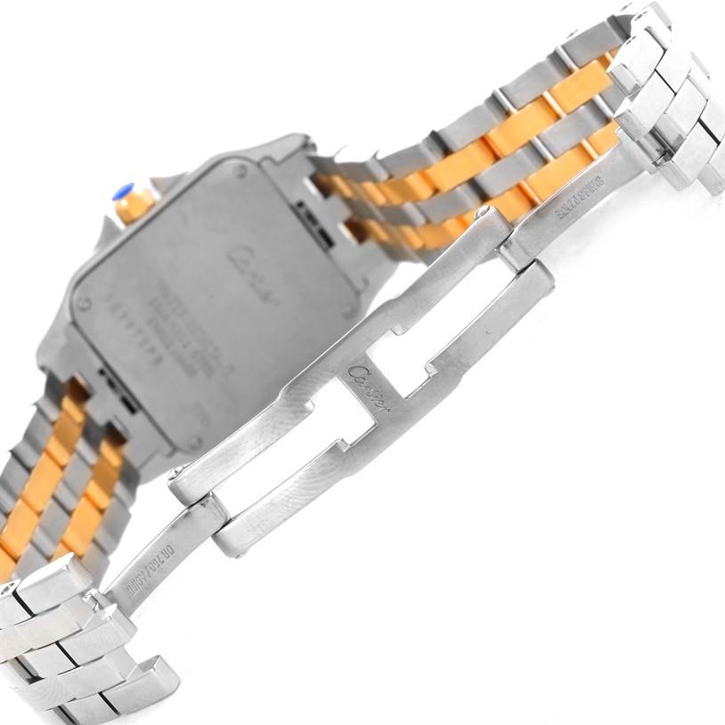The image shows the back and clasp of the Cartier Santos Demoiselle W25067Z6 Women's Steel and Gold (two tone) Silver Dial W25067Z6 Women's Steel and Gold (two tone) Silver Dial watch, focusing on its stainless steel bracelet.