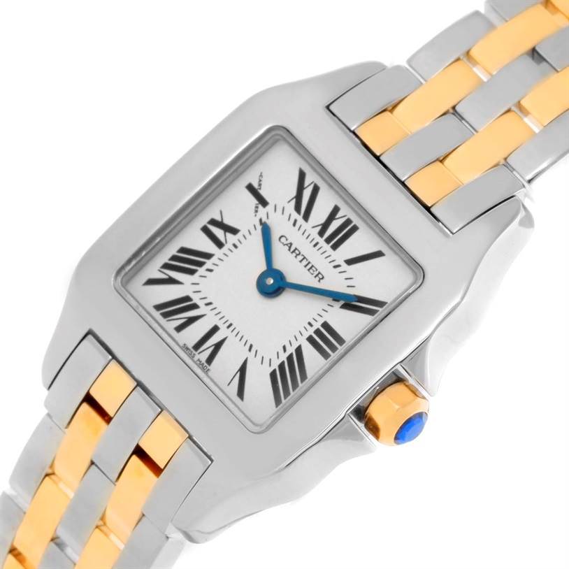 The image shows a close-up, angled view of the Cartier Santos Demoiselle W25066Z6 Women's Steel and Gold (two tone) Silver Dial W25066Z6 Women's Steel and Gold (two tone) Silver Dial watch face and part of the two-tone band.