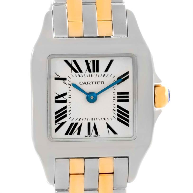 The image shows a front view of a Cartier Santos Demoiselle W25066Z6 Women's Steel and Gold (two tone) Silver Dial W25066Z6 Women's Steel and Gold (two tone) Silver Dial watch, highlighting its face, bezel, and part of the bracelet.