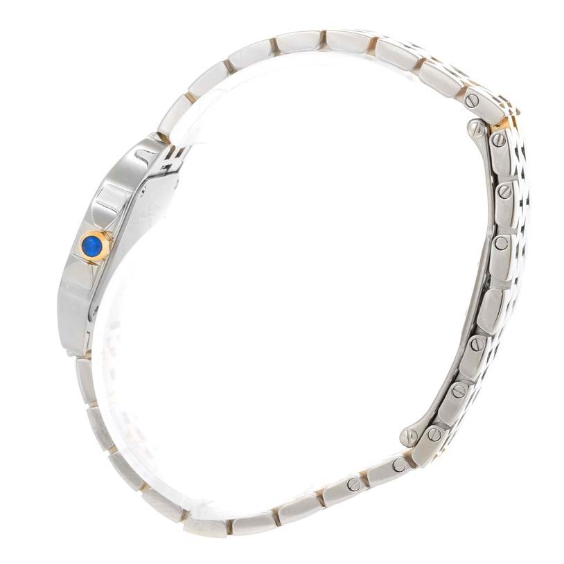 The image shows a side profile view of the Cartier Santos Demoiselle W25066Z6 Women's Steel and Gold (two tone) Silver Dial W25066Z6 Women's Steel and Gold (two tone) Silver Dial watch, highlighting the watch's band and crown.