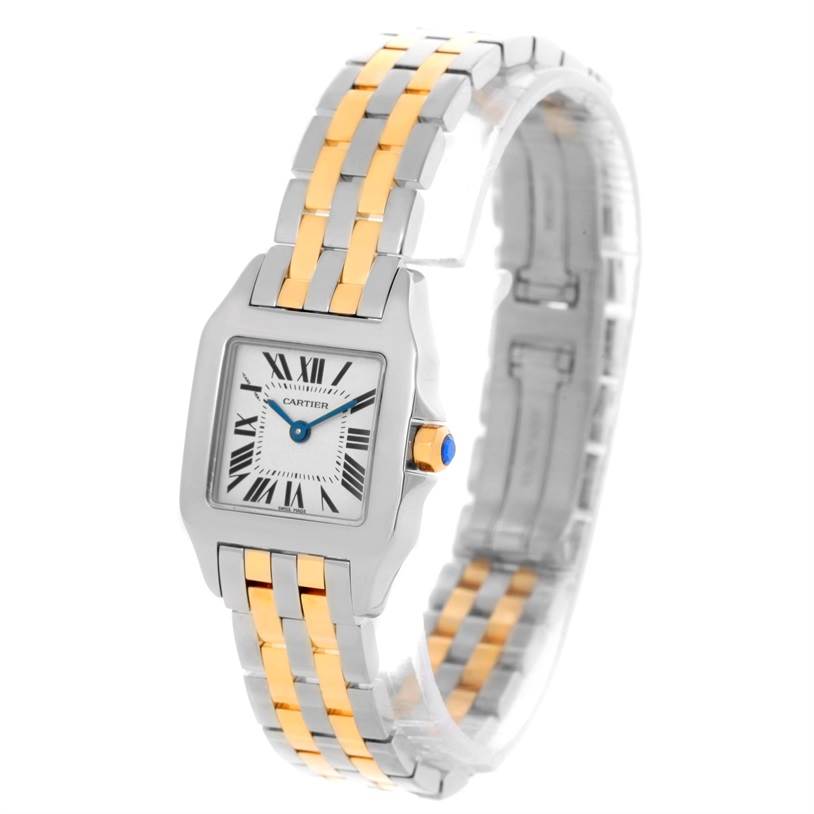 The Cartier Santos Demoiselle W25066Z6 Women's Steel and Gold (two tone) Silver Dial W25066Z6 Women's Steel and Gold (two tone) Silver Dial watch is shown at a three-quarter angle, displaying its face, bracelet, and crown.