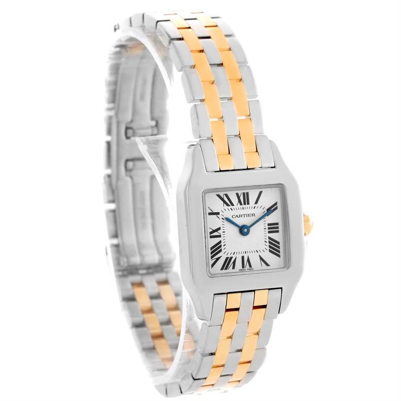 The Cartier Santos Demoiselle W25066Z6 Women's Steel and Gold (two tone) Silver Dial W25066Z6 Women's Steel and Gold (two tone) Silver Dial watch is shown at a three-quarter angle, featuring its two-tone bracelet and square face with Roman numerals.