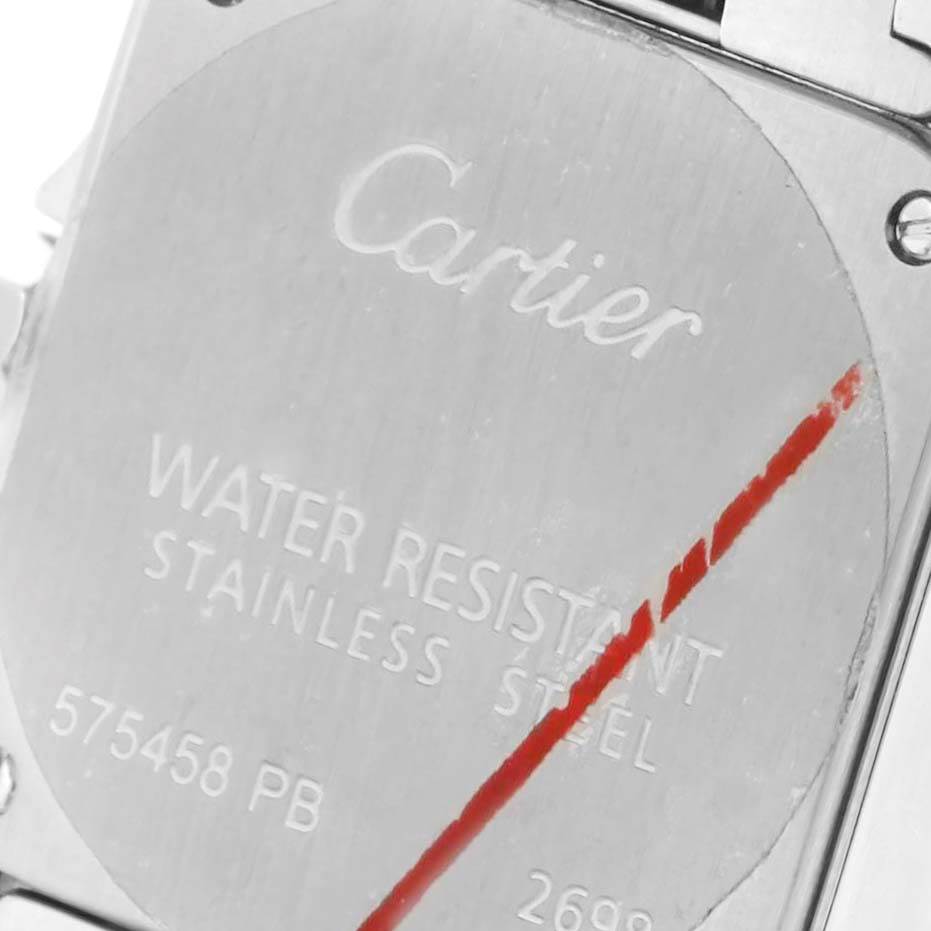 The image shows the back case of a Cartier Santos Demoiselle W25065Z5 Women's Steel and Gold (two tone) Silver Dial W25065Z5 Women's Steel and Gold (two tone) Silver Dial watch, highlighting the brand engraving and water resistance details.