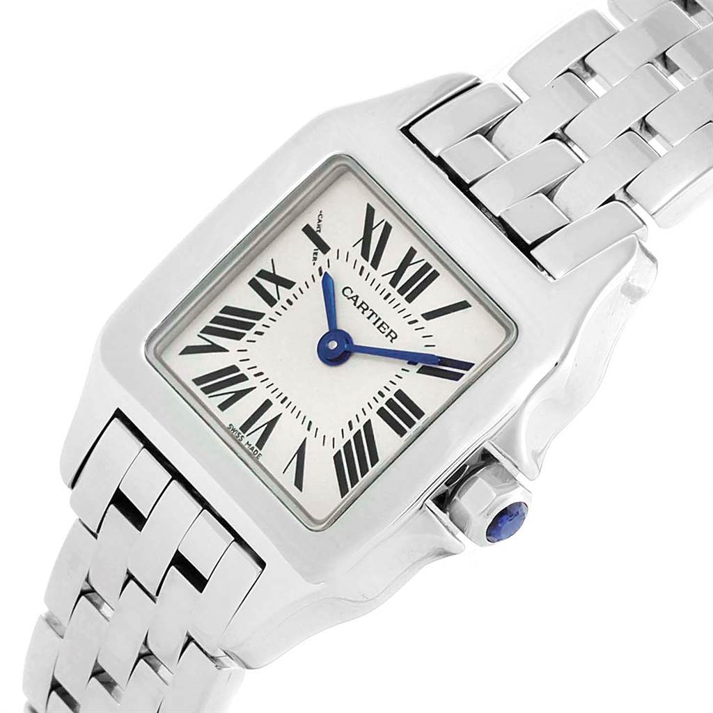 The Cartier Santos Demoiselle W25065Z5 Women's Steel and Gold (two tone) Silver Dial W25065Z5 Women's Steel and Gold (two tone) Silver Dial watch is shown at an angled view, highlighting its face, bezel, bracelet, and crown. 