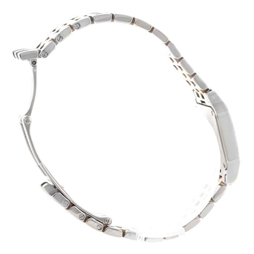 The image shows a side view of the bracelet and case of the Santos Demoiselle model by Cartier.