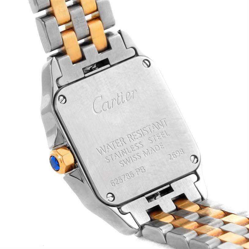 The image shows the back case and part of the bracelet of the Cartier Santos Demoiselle W25066Z6 Women's Steel and Gold (two tone) Silver Dial W25066Z6 Women's Steel and Gold (two tone) Silver Dial watch.