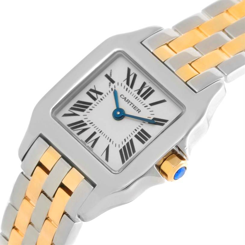 This image shows the face and part of the two-tone bracelet of the Cartier Santos Demoiselle W25066Z6 Women's Steel and Gold (two tone) Silver Dial W25066Z6 Women's Steel and Gold (two tone) Silver Dial watch at an angle.