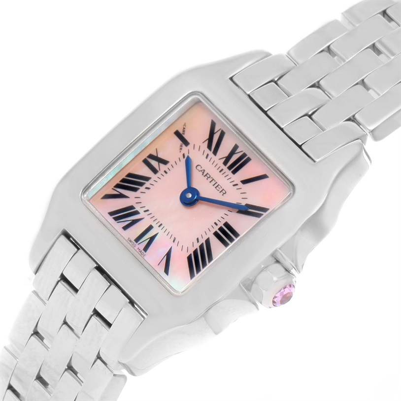 The image shows a Cartier Santos Demoiselle W25075Z5 Women
s Stainless Steel Mother of Pearl Dial W25075Z5 Women
s Stainless Steel Mother of Pearl Dial watch from a top angle, highlighting the pink dial, Roman numerals, and metal bracelet.