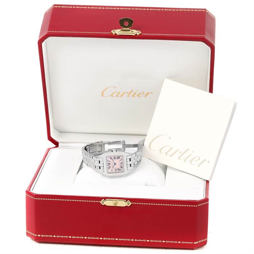 The image shows a Cartier Santos Demoiselle W25075Z5 Women
s Stainless Steel Mother of Pearl Dial W25075Z5 Women
s Stainless Steel Mother of Pearl Dial watch front view, in an open red Cartier box with a booklet.