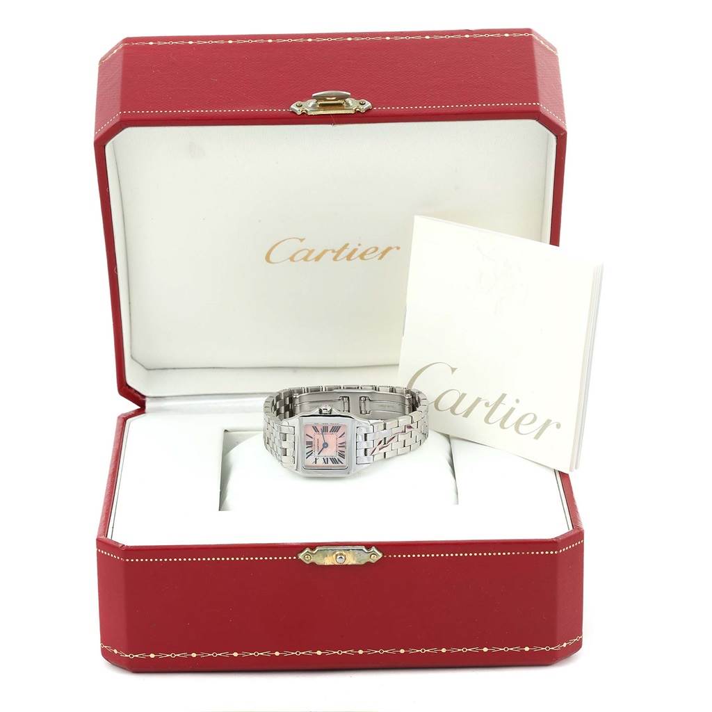 The image shows a Cartier Santos Demoiselle W25075Z5 Women's Stainless Steel Mother of Pearl Dial W25075Z5 Women's Stainless Steel Mother of Pearl Dial watch in an open red box, accompanied by a booklet.