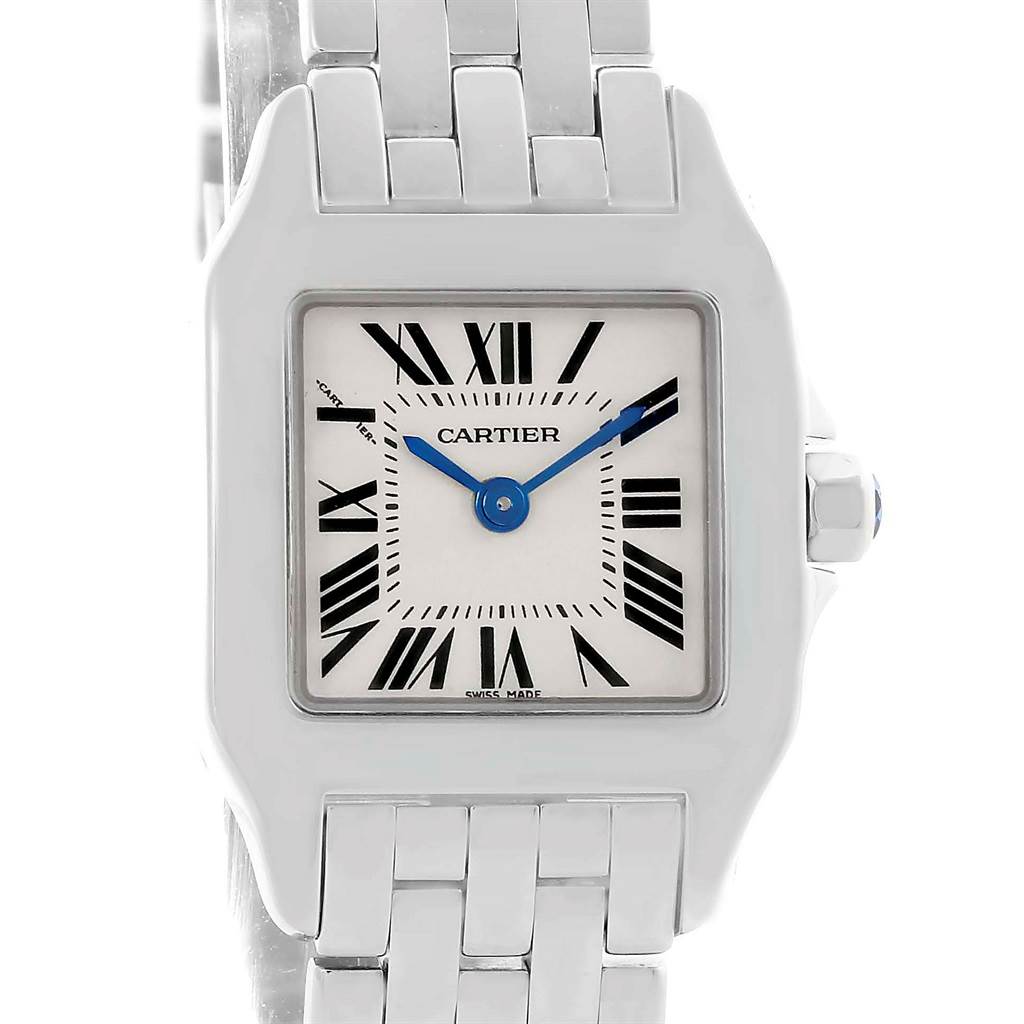 The Cartier Santos Demoiselle W25064Z5 Men's Stainless Steel Silver Dial W25064Z5 Men's Stainless Steel Silver Dial watch is shown from a front angle, displaying its face, strap, and crown.
